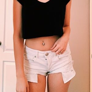 white ripped jean shorts